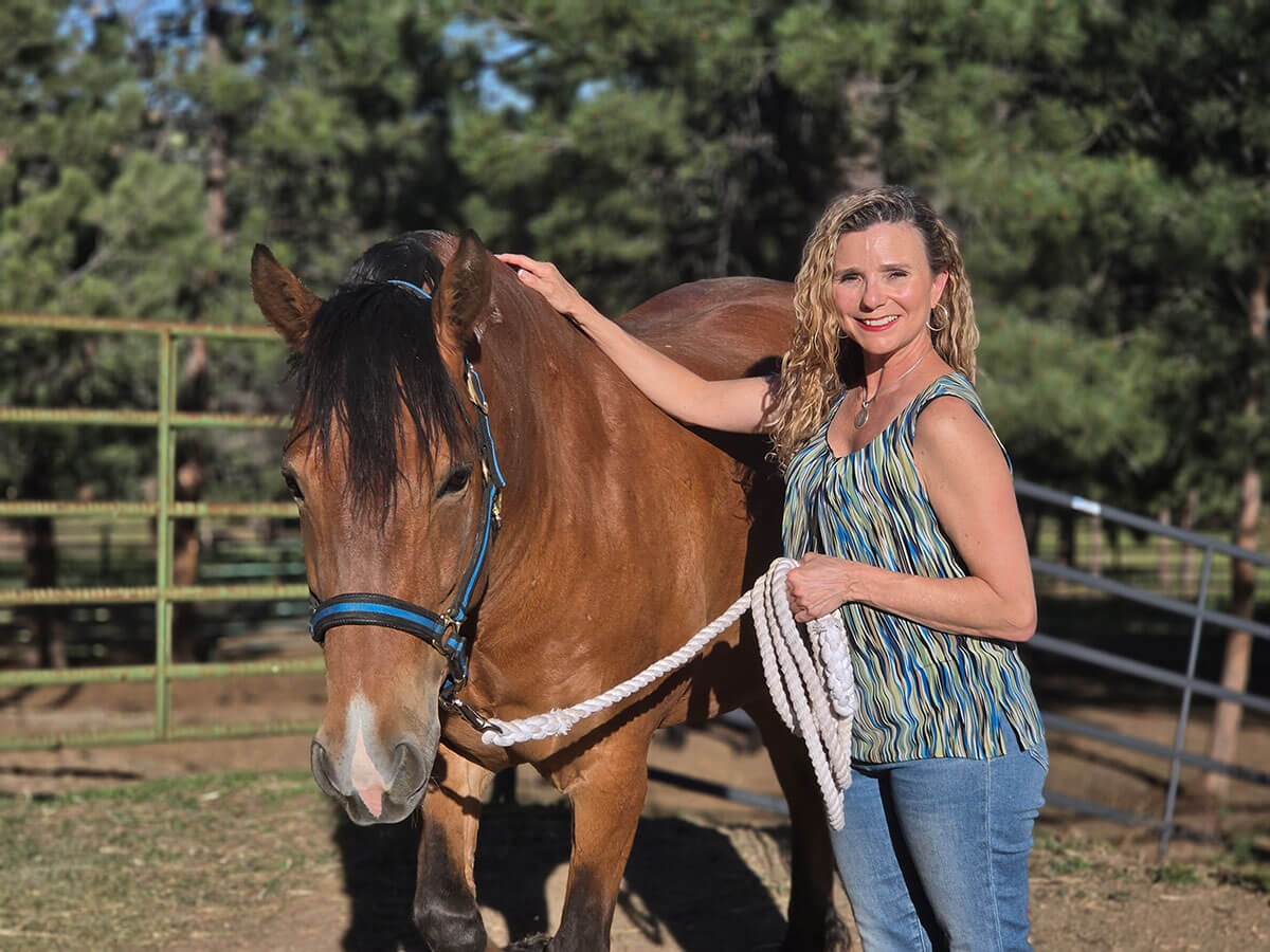 Jena Queston DVM and Mustang